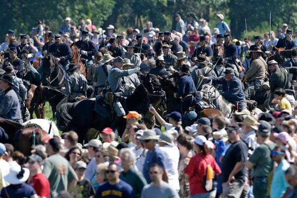 Reenactors-demonstrate-a-cavalry-bat