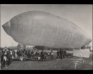 Knabenshue Dirigible: In this airship A. Roy Knabenshue, Toledo aviation pioneer and son of Blade editor S.S. Knabensue, flew from the fair grounds at Dorr and Upton  to the top of the Spitzer Building on June 30, 1905.