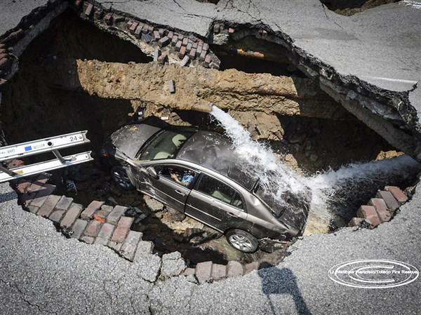 Giant Sinkhole Swallows Car | The Blade