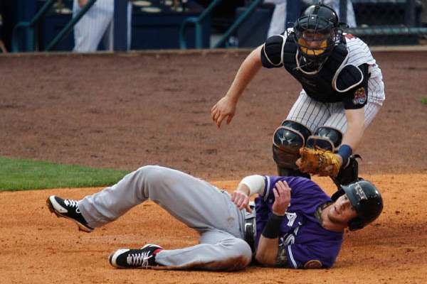 Louisville-s-Jason-Donald-scores-when-Toledo-catcher-Bry