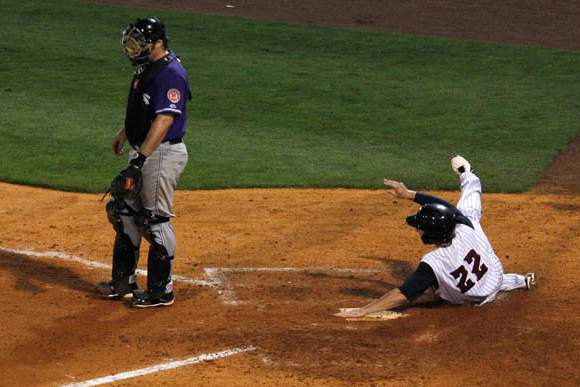 Toledo-s-Ben-Guez-scores-the-winning-run-off-a-hit-by-Danny-Worth-during-10th-inning