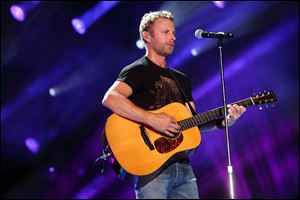 Country musician Dierks Bentley, formerly of Arizona, is inviting musicians to perform in a concert in Prescott Valley, Ariz., to benefit the families of 19 firefighters who were killed while battling a wildfire.