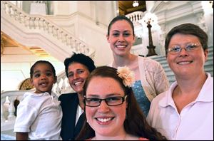 The Whitewoods — Landon, 2, Susan, 49, Abbey, 16, Katie, 14, and Deb, 45 — are the lead plaintiffs in a suit seeking to overturn a state law banning same-sex marriage.