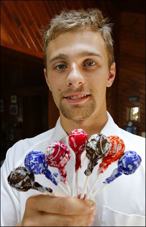 Cory Heid took a math view to solve how many licks it takes to reach a Tootsie Pop’s center.