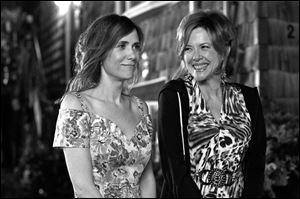 Kristen Wiig, left, and Annette Bening in a scene from ‘Girl Most Likely.’