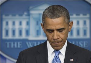 President Barack Obama pauses as he speaks about the fatal shooting of Trayvon Martin by George Zimmerman. The president made a surprise appearance today during the daily news briefing at the White House in Washington.