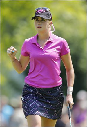 Paula Creamer celebrates a birdie putt on 5.