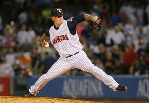 Hens pitcher Jeremy Bonderman delivers a pitch against Buffalo in the eighth inning. He has five scoreless innings for the Hens.