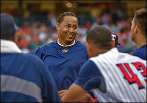 Jair Jurrjens jokes with teammates before Friday night’s game against Buffalo at Fifth Third Field.