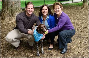 Lancaster resident Angela Bauman, center, and her German Shorthaired Pointer Beau are joined by licensed contractor and TV personality Jason Cameron and dog expert Arden Moore to celebrate the $500,000 Dream Dog Park renovation of Buchanan Park Dog Park in Lancaster, Pa in April. Beneful awarded the in-kind donation to the City of Lancaster after Bauman won the 2012 Beneful Dream Dog Park Contest. 