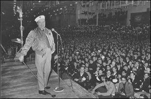 Comedian Bob Hope entertains sailors of the U.S. 6th Fleet Saratoga at the flagship's anchorage in the southern Italian port of Gaeta, in this Dec. 19, 1970 file photo. An exhibit called Bob Hope: An American Treasure will celebrate the beloved comedian at the National World War II Museum in New Orleans.