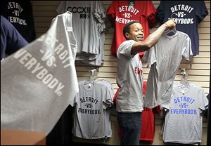 A store in Detroit’s Greektown sells ‘Detroit vs. Everybody’ clothing — a reflection of the defiant pride Detroiters often feel.