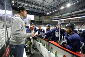 Walleye defenseman Phil Oreskovic, left, coaches Team Blue during the team's annual free-agent camp. A total of 80 hopefuls are working out for the squad.