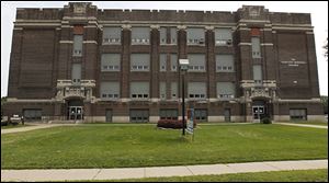 The Toledo Board of Education is considering moving its offices from the  Thurgood Marshall Building to the former DeVilbiss High, which houses the Toledo Technology Academy.