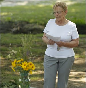 Bonnie Hunter, a longtime friend of Bonita Scheidel, speaks at the amphitheater dedication about the contributions Mrs. Scheidel made to Sylvania and her love of children, nature, and community. 