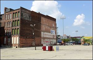 The Consumers Plumbing building is considered too far gone to restore and would be demolished under the Mud Hens' proposal for the neighborhood.