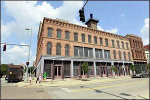 Vacant buildings at 3 and 9 N. St. Clair are part of a proposal by the Mud Hens for a $10 million to $15 million project to redevelop structures near the stadium. The organization is applying for tax credits.