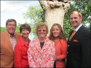 From left, host Mike and Jan WIlcox, and BGSU president Mary Ellen Mazey, welcome Stephanie and Chris Klingston, the new athletic director at BGSU.