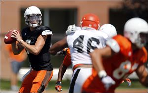 BGSU quarterback Matt Schilz (7)  looks to throw during a  football scrimmage Sunday at Doyt Perry Stadium in Bowling Green. Schilz will be the starting quarterback against Tulsa Aug. 29.