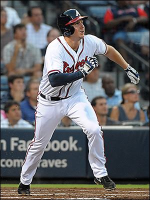 Atlanta's Elliot Johnson takes off after hitting a triple in the second inning Tuesday night against Cleveland to drive in the game's only runs.