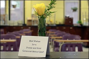 Mr. Yenrick gave a single yellow rose and a welcome card to all of the employees on the first day of school on Tuesday.