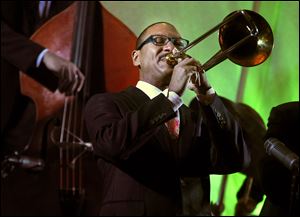 Delfeayo Marsalis performs before 200 enthusiastic people at the Grand Premier Hotel ballroom in Toledo.