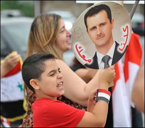 Members of the local Syrian community rally for the second day in a row against the United States' involvement in Syria, Wednesday, in Allentown, Pa.