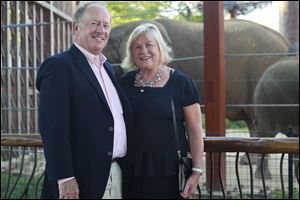 John and Ann Meier visit the elephant habitat during the Feast with the Beasts.