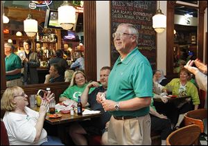 D. Michael Collins can’t help but smile as he looks at the early results.