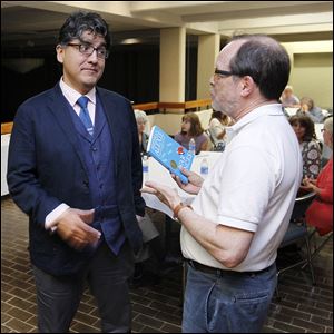 Author Sherman Alexie, left, meets fan Ken Adler prior to Mr. Alexie's speech as part of the the Authors! Authors! series at the Stranahan Theater. 