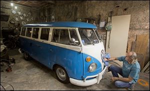 Enio Guarnieri wipes the emblem of his 1972 Volkswagen van in Sao Paulo. Guarnieri bought the van, or ‘Kombi,’ a year ago. When he was 10, his father taught him to drive a Kombi. ‘Driving a Kombi with your face up against the windshield is a thrilling adventure,’ he said. ‘There is no other van like it.’