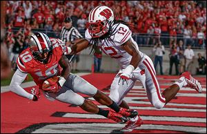 Ohio State's Corey Brown makes a catch for a touchdown against  Wisconsin's Dezmen Southward in the second quarter.