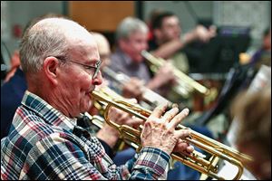 Jim Myers of Archbold, a Korean War veteran, is one of a number of trumpeters in the Owens College Community Band. The band's annual veterans concert will be at 2:30 p.m. Oct. 13 at the Center for Fine and Performing Arts Theater at Owens’ Toledo-area campus.