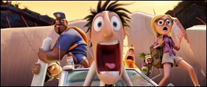 From left, Sam Sparks, voiced by Anna Faris, Barry the Strawberry, voiced by Cody Cameron, and Flint Lockwood, voiced by Bill Hader in a scene from 