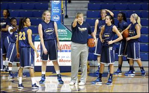 University of Toledo basketball coach Tricia Cullop speaks to her team at its first practice Wednesday.