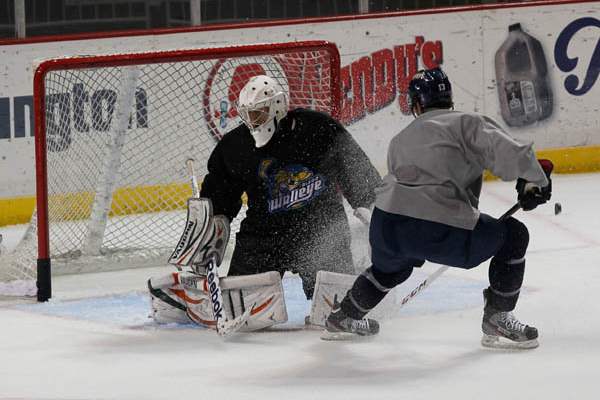 Walleye-goalie-Neil-Conway-and-forward-Stephon-Thorne