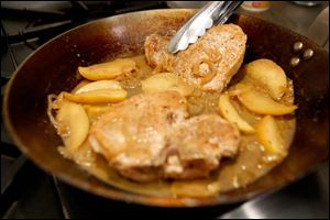 Pork chops with Braeburn apples. 