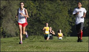 Bowsher’s Megan Johnson clocked in at 21:18.39 to prevail in the City League girls cross country meet.