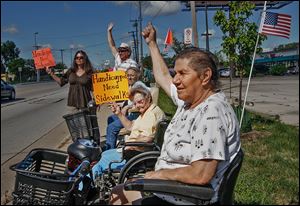 Demonstrations by residents of Navarre Avenue,  in summer 2011, protested safety hazards on the commercial corridor.