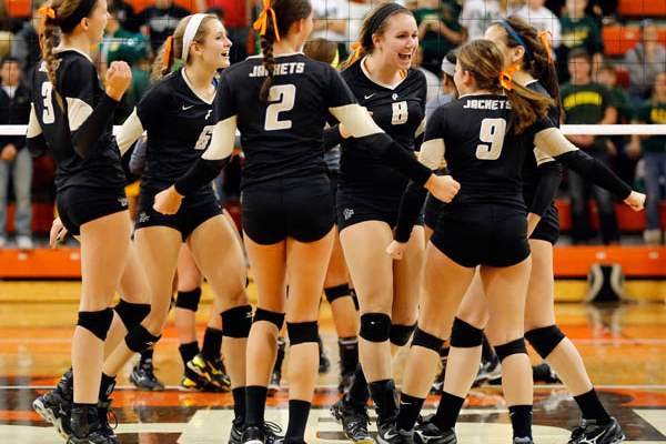 Perrysburg-celebrates-scoring-a-point-against-Clay-serve