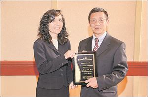 Ivana de la Serna, Ph.D., The University of Toledo, 2012 Discover Award Honoree, Fan Dong, M.D., Ph.D., The University of Toledo, 2013 Discover Award Honoree