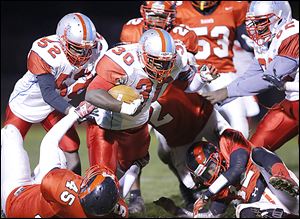 Bowsher’s Mark Washington  ran 19 times for 219 yards and five touchdowns as the Rebels beat Rogers on Thursday night.