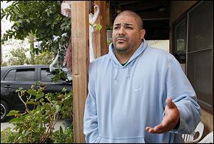 Irwindale resident Rafael Gomez, 34, expresses his complaints about the chili odors emanating  from the production of Sriracha chili sauce at the Huy Fong Foods factory in Irwindale, Calif. Residents claim the odor from the plant is a public nuisance.