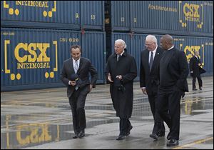 Touring CSX facilities in North Baltimore, Ohio, are, from left, Oscar Munoz, chief operating officer and executive vice president of CSX Corp.; U.S. Vice President Joe Biden; Wilby Whitt, CSX Intermodal Terminals Inc. president; and U.S. Secretary of Transportation Anthony Foxx.