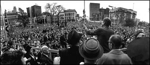 John F. Kennedy speaking from the Adams Street side of the Lucas County Courthouse in downtown Toledo on Nov. 4, 1960, drew a huge and enthusiastic crowd just days before the young senator was elected president. 