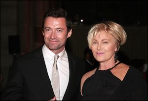 Actor Hugh Jackman, left, and his wife, actress Deborra-Lee Furness, right, in New York in September.