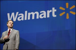 Doug McMillon, President and CEO, Wal-Mart International, speaks at the shareholders meeting in Fayetteville, Ark., in June.