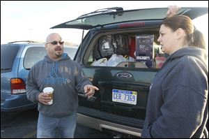 Rodney and Keri Galvan  of Morenci, Mich., started shopping at 4:30 p.m. Thursday and were still at it at 9 a.m. Friday. The couple got a jump on their holiday shopping by starting on Thanksgiving Day.