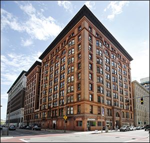 The 117-year-old Spitzer Building in Toledo closed in December because of low occupancy rates. The city and Lucas County commission-ers each contributed $15,000 to keep the structure from falling into disrepair.