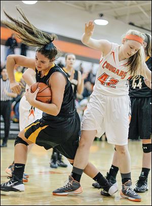 Northview’s Kendall Jessing, left, who had 18 points, rips the ball away from Southview’s Emily Westphal.